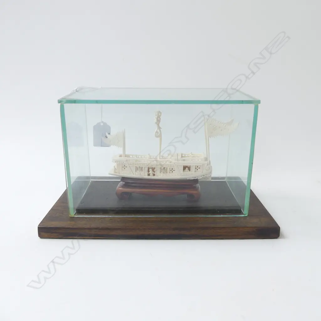 CARVED IVORY CHINESE FANCY JUNK BOAT w elaborate detail of figures balustrades sails etc L.150mm. On stand in glass case Image 1++
