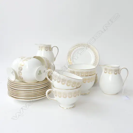  WEDGWOOD ERIC RAVILIOUS 'GOLDEN PERSEPHONE' PART TEA SET; 6 CUPS, 10 SAUCERS, 11 PLATES, 2 SUGAR & 2 MILK JUGS