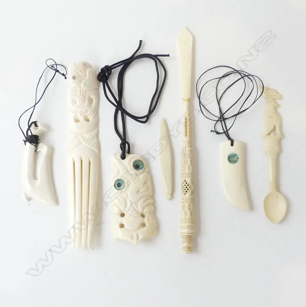 7 CARVED BONE PCES; TIKI L.90mm & HOOK PENDANT, COMB L.180mm, SPOON, ETC Image 1++