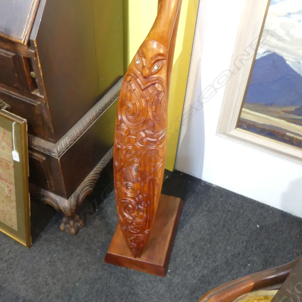 **RTV** WAKA HOE; MAORI CARVED WOODEN ORNAMENTAL CANOE PADDLE L.1520mm ON STAND H.870mm Image 1++