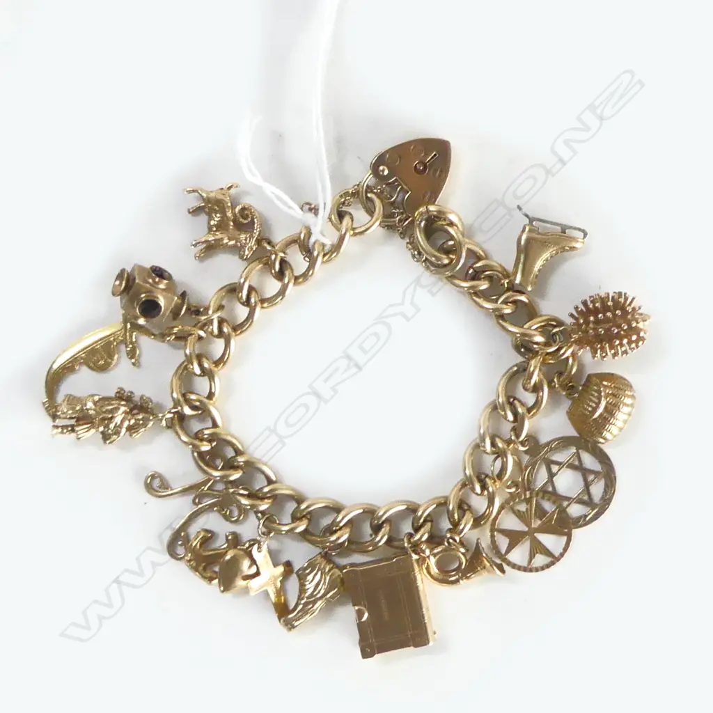 9ct YELLOW GOLD HEAVY CHARM BRACELET 44.5gms Image 1++
