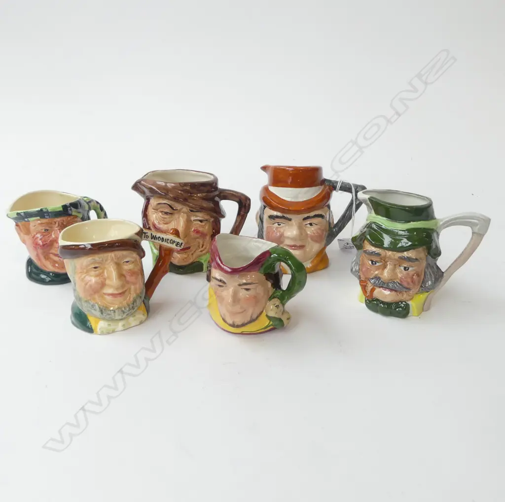 6 CHARACTER JUGS H.90mm Image 1++