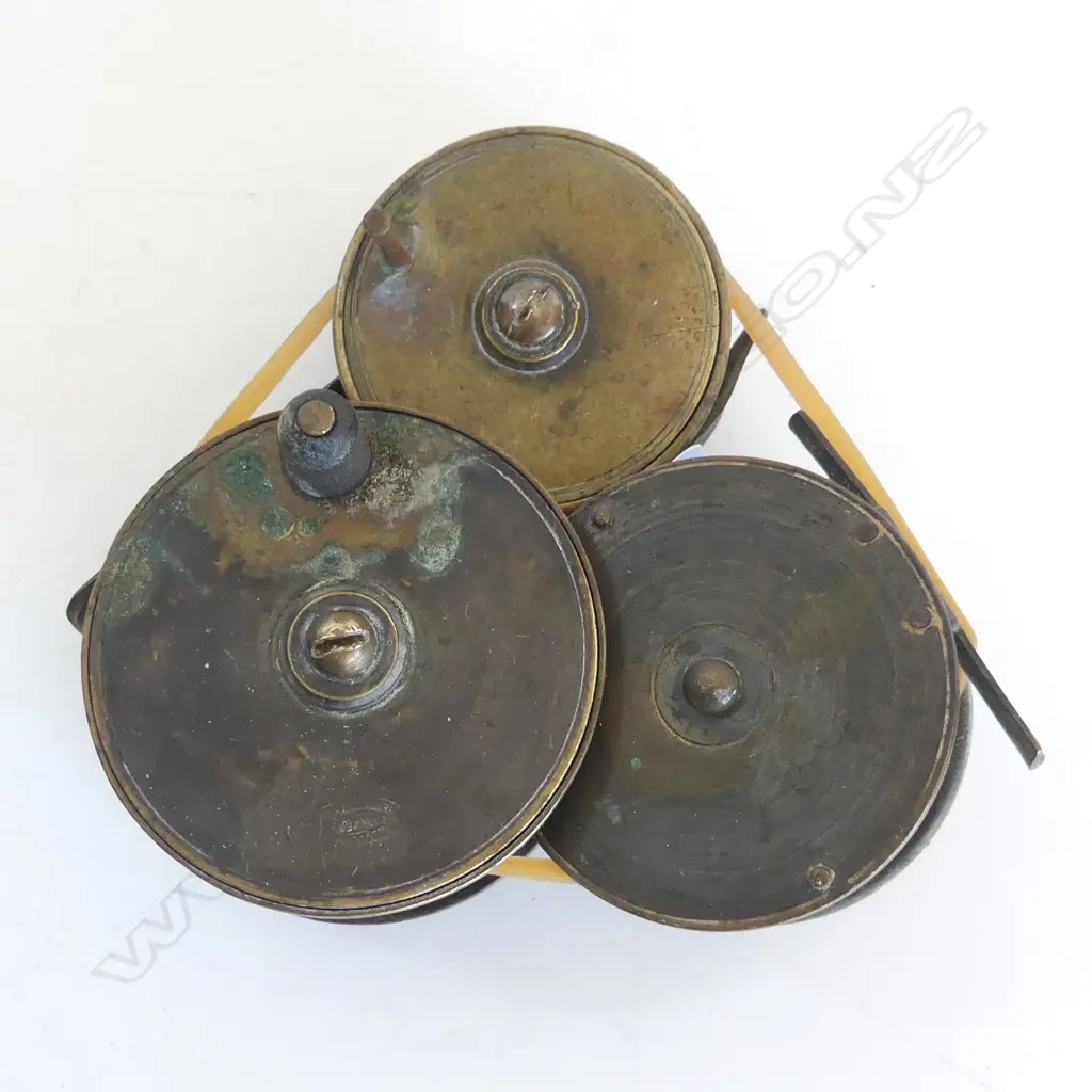 THREE BRASS OLD FISHING REELS , TWO MARKED ALLCOCKS Image 1++
