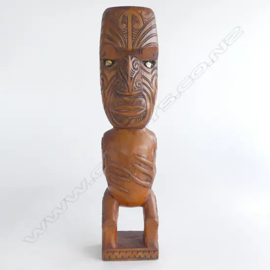 MAORI CARVED TEKOTEKO paua shell eyes mid/late 20thC. H.310mm.