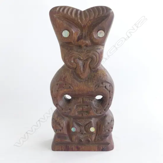 MAORI CARVED & EBONISED TEKOTEKO paua shell eyes mid/late 20thC. H.205mm. Collected U.S.A. c1990's
