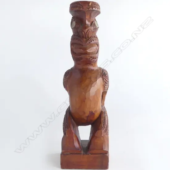 MAORI CARVED TEKOTEKO paua shell eyes mid/late 20thC. H.280mm.