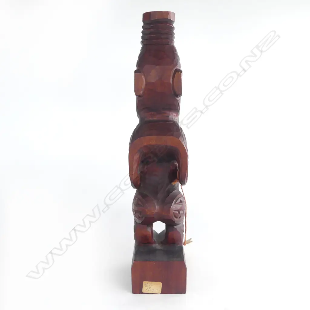 MAORI CARVED TEKOTEKO mid/late 20thC. H.335mm. Labelled 'Aotearoa Wholesale' Rotorua.... Image 1++