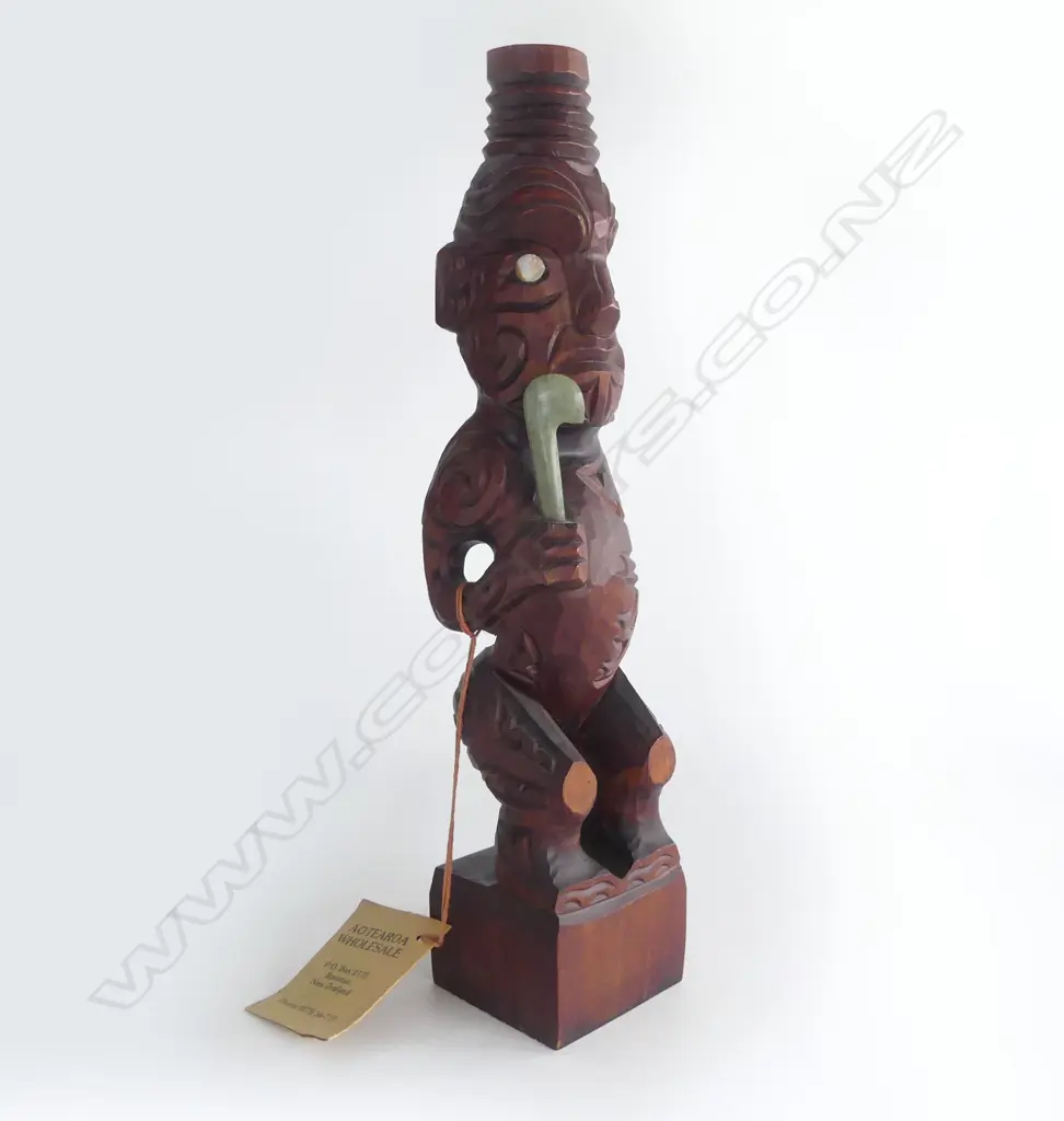 MAORI CARVED TEKOTEKO mid/late 20thC. H.335mm. Labelled 'Aotearoa Wholesale' Rotorua.... Image 1++