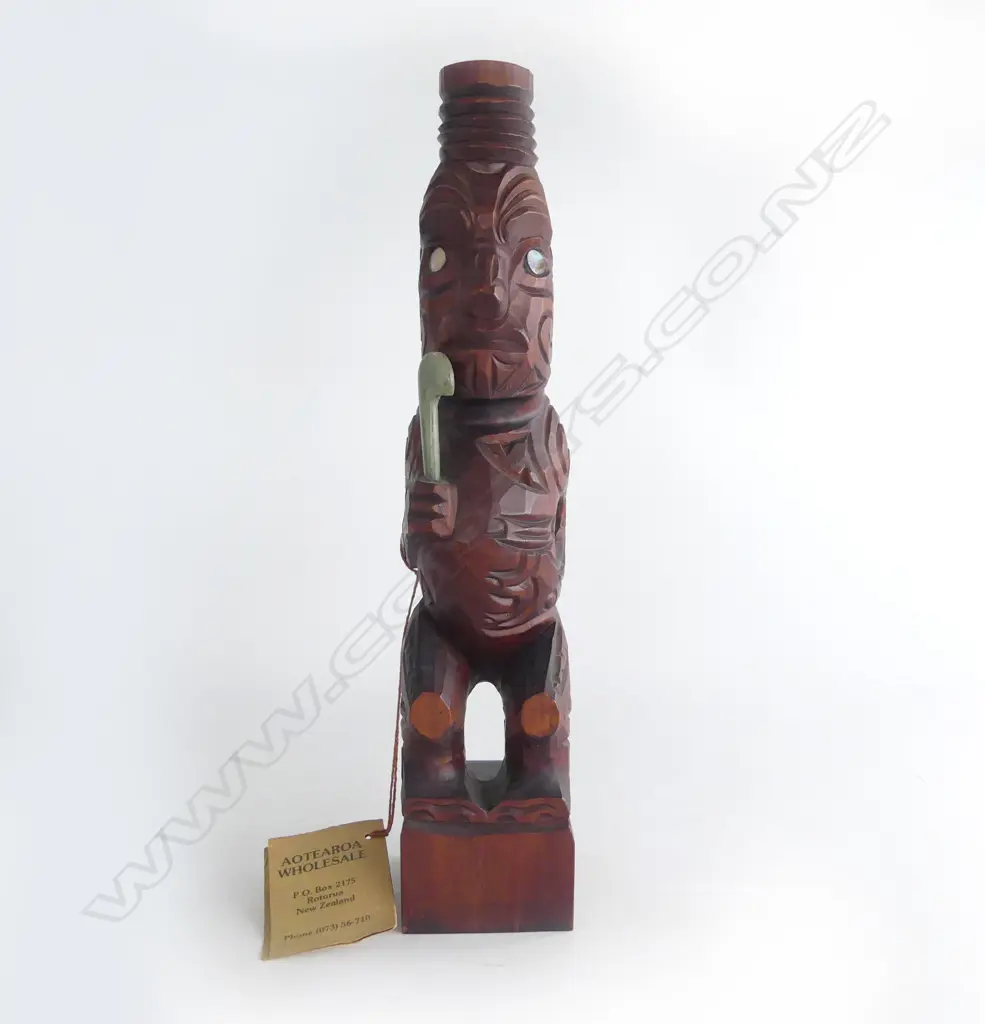 MAORI CARVED TEKOTEKO mid/late 20thC. H.335mm. Labelled 'Aotearoa Wholesale' Rotorua.... Image 1++