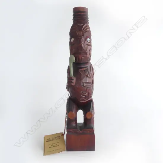 MAORI CARVED TEKOTEKO mid/late 20thC. H.335mm. Labelled 'Aotearoa Wholesale' Rotorua....