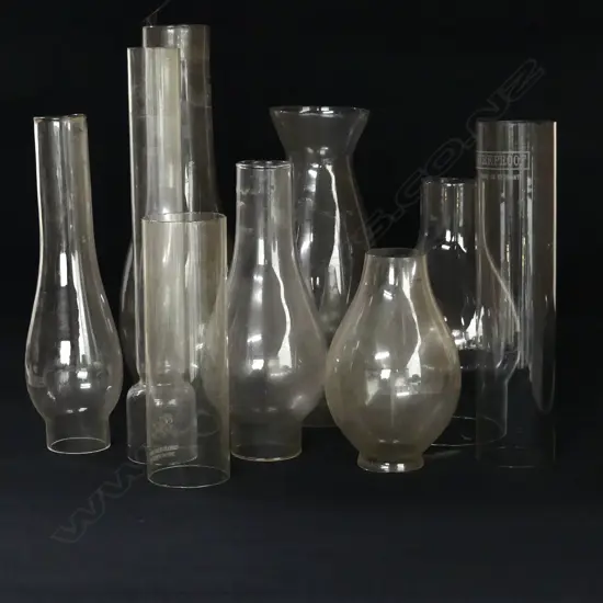 NINE GLASS CHIMNEYS FOR KEROSENE LAMPS H.13CM-26CM
