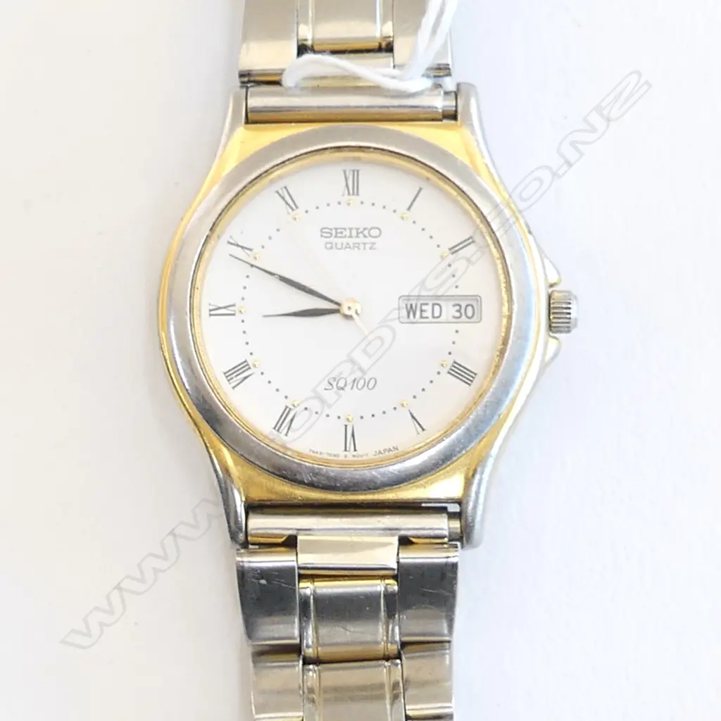 SEIKO QUARTZ SQ100 stainless & gold plate gent's WRISTWATCH Image 1++