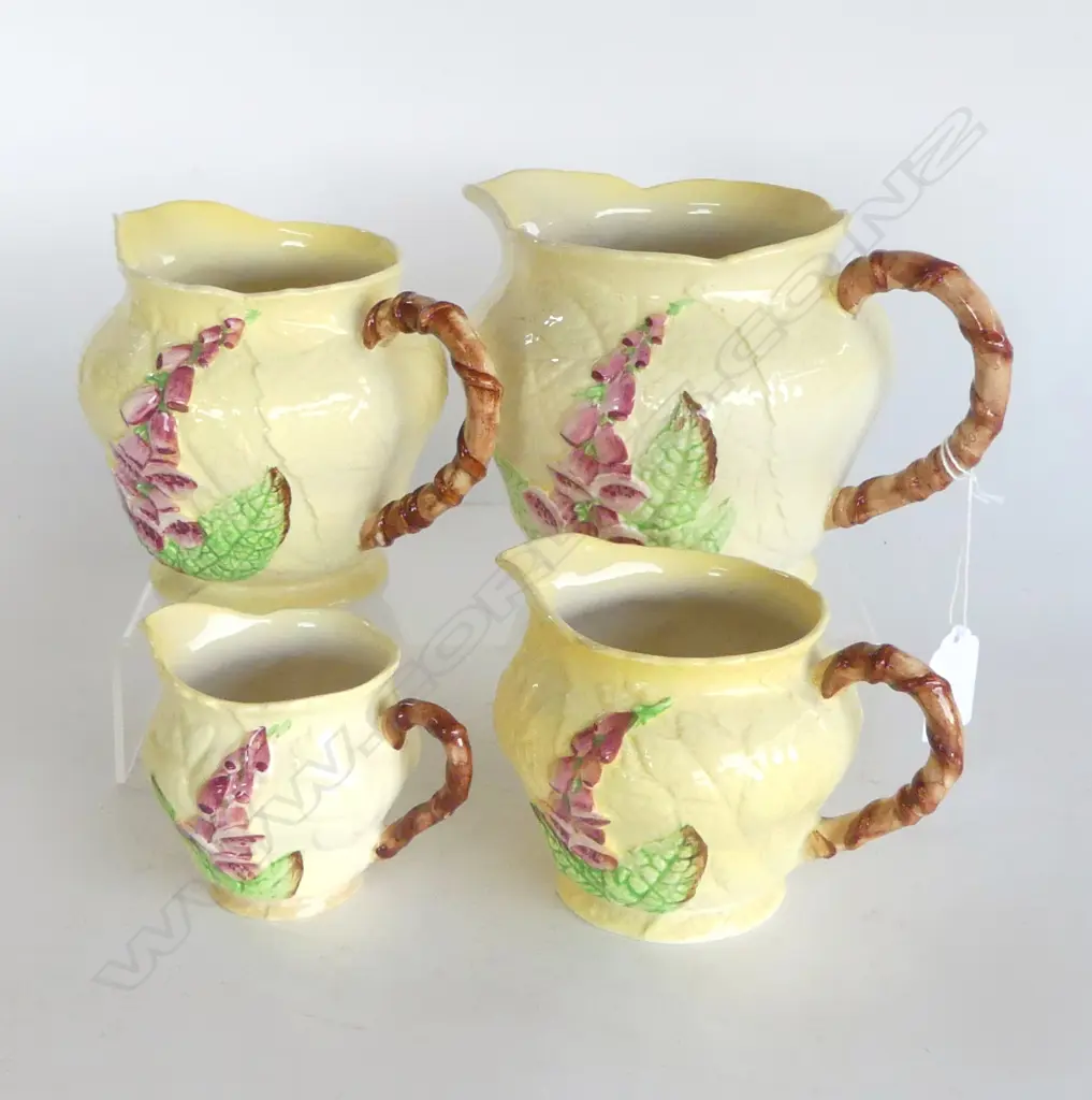 SET OF 4 GRADUATED YELLOW HOLLYHOCK PAT CARLTONWARE JUGS TALLEST120MM SMALLEST 70MM Image 1++