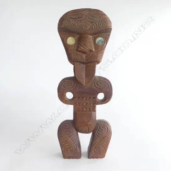 MAORI CARVED HARDWOOD TEKOTEKO paua shell eyes mid/late 20thC. H.345mm.