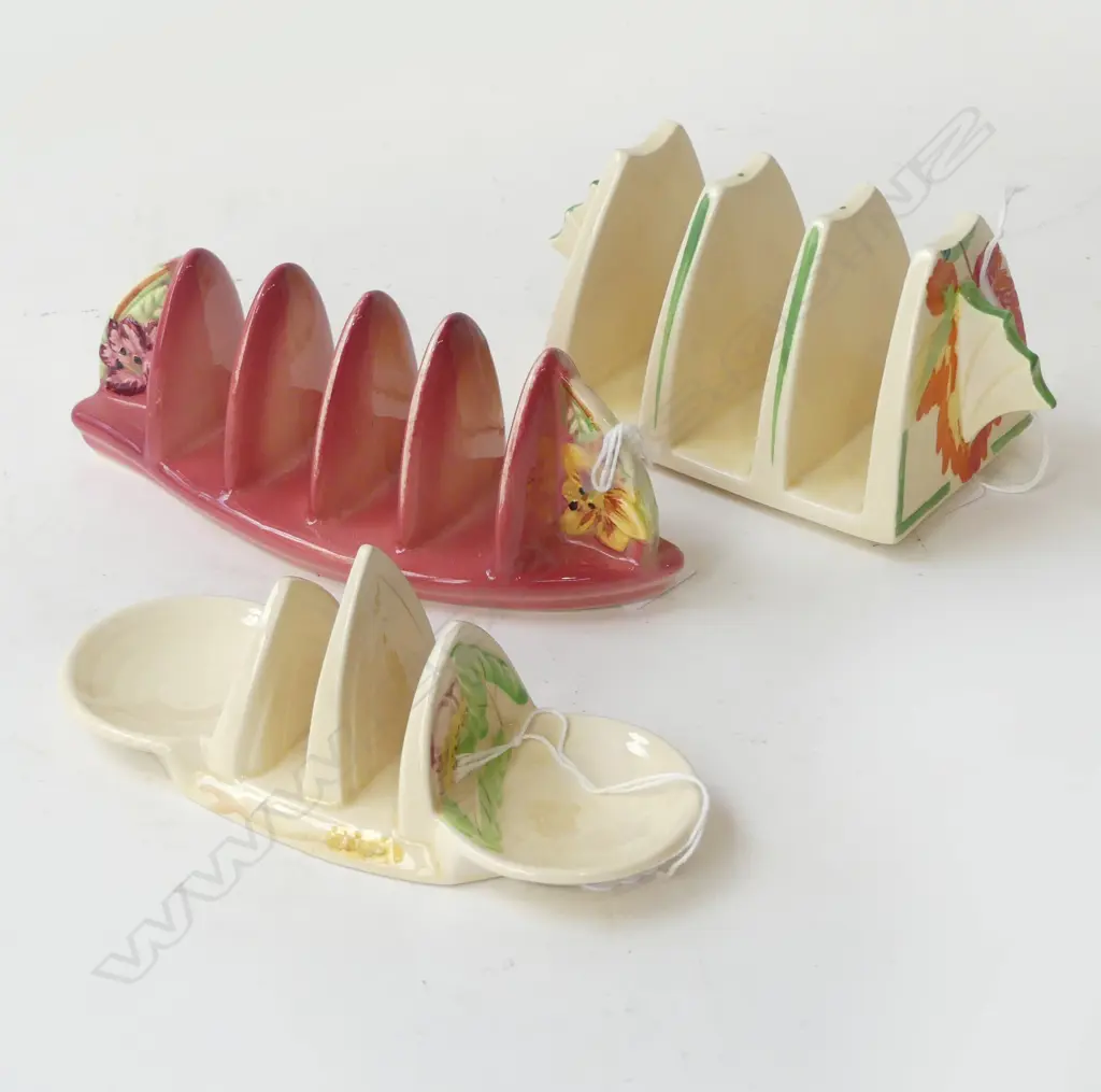 THREE ENGLISH CHINA DECO SHAPES TOAST RACK, L.170mm Image 1++