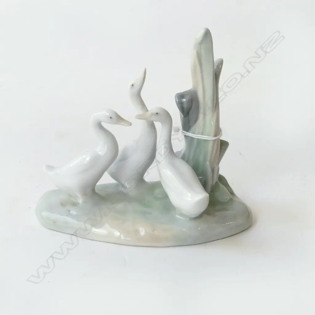 REX CHINA  FIGURINE OF A BOY WITH A HURT FOOT, H.190mm & NAO DUCK ?, H.120mm Image 1++
