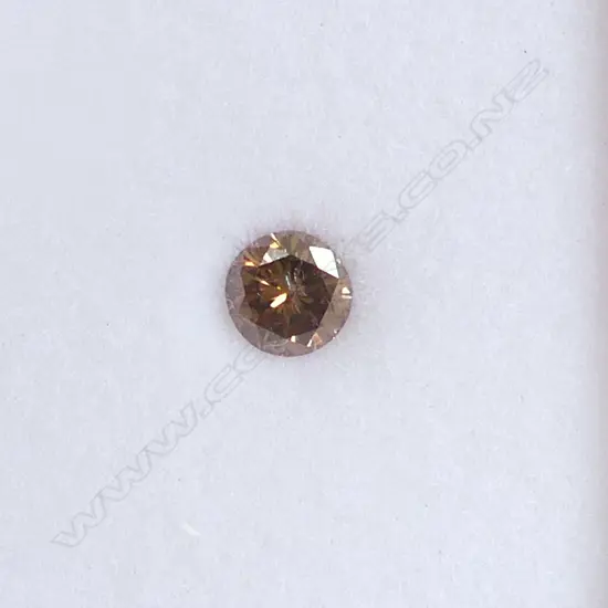A  LOOSE DIAMOND ROUND COLOUR COGNAC 0.65CT
