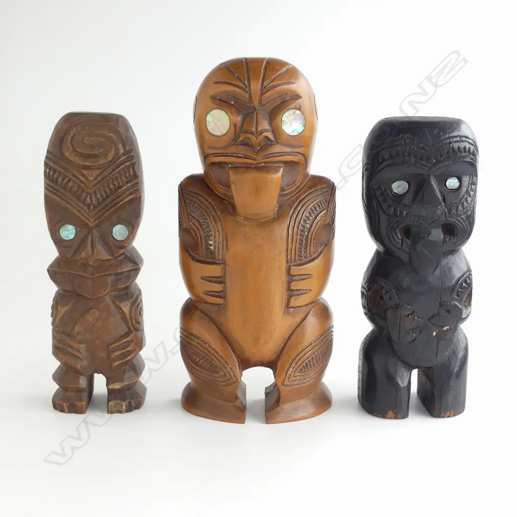 3 MID/LATE 20thC MAORI CARVED STYLISED SMALL TEKOTEKO FIGURES paua inserts Tallest 210mm. Image 1++
