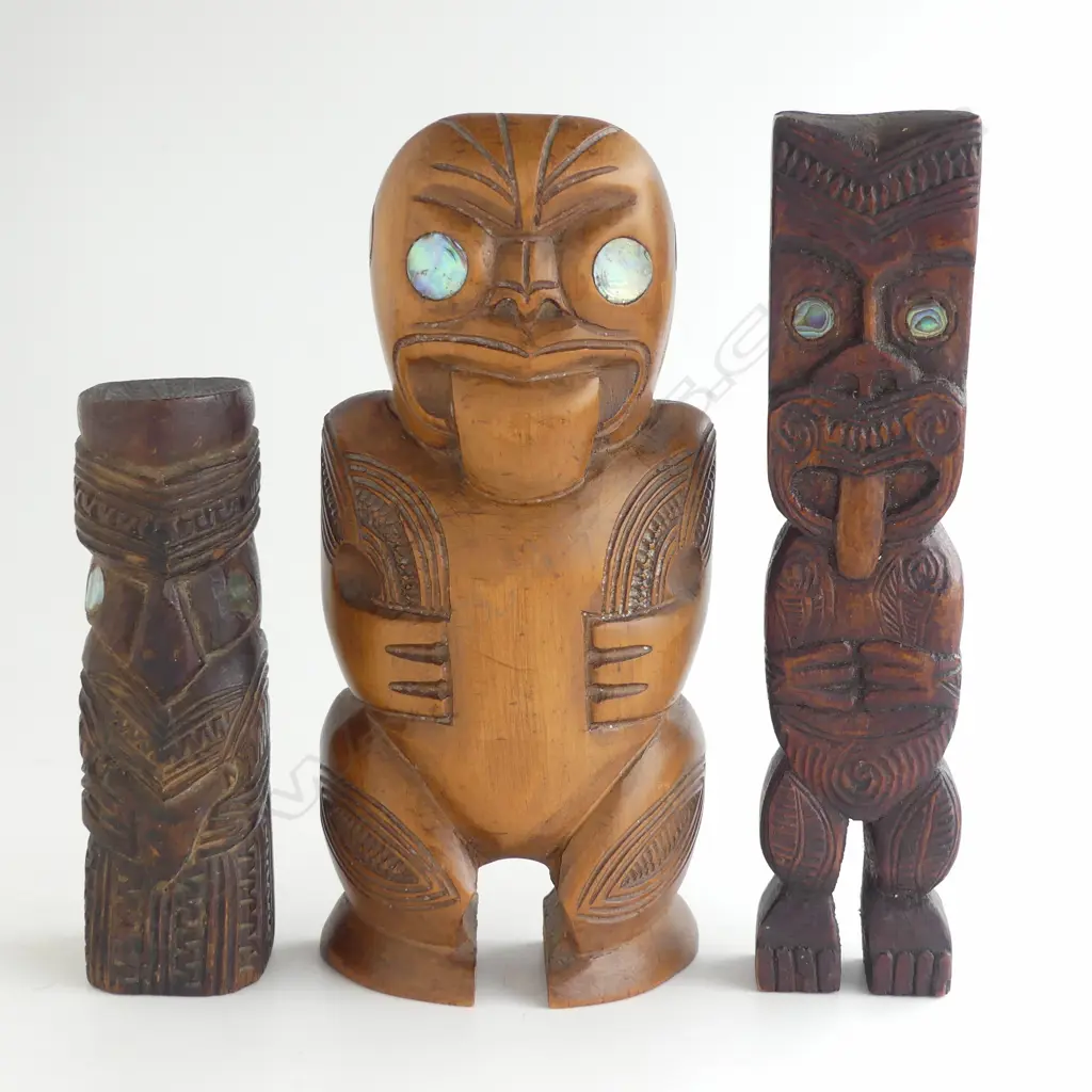 3 MID/LATE 20thC MAORI CARVED STYLISED SMALL TEKOTEKO FIGURES paua inserts Tallest 210mm Image 1++