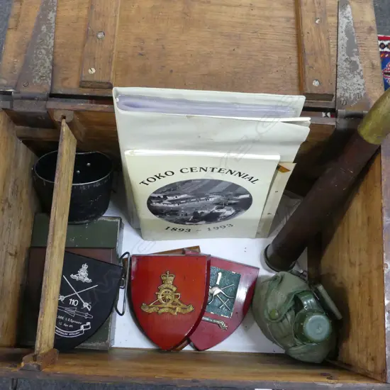 WOODEN BOX 545x370x330mm + ASST. MILITARY CONTENTS; SHIELDS, WWII NEWSPAPER CLIPPINGS ETC