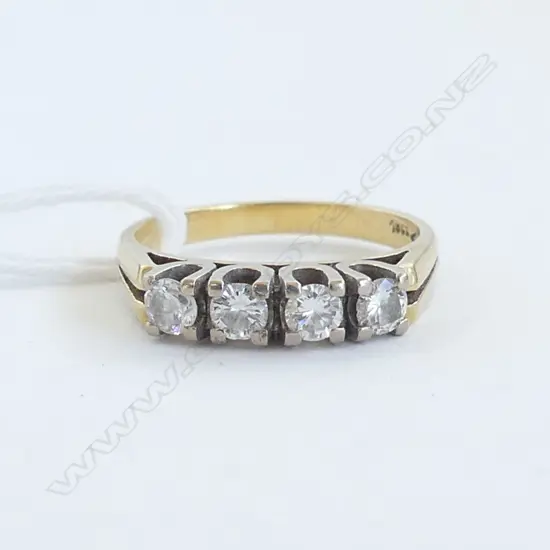 18CT GOLD & 4 DIAMOND BRIDGE RING 4.74gms  SIZE O 1/2  DAMAGE TO 2 STONES