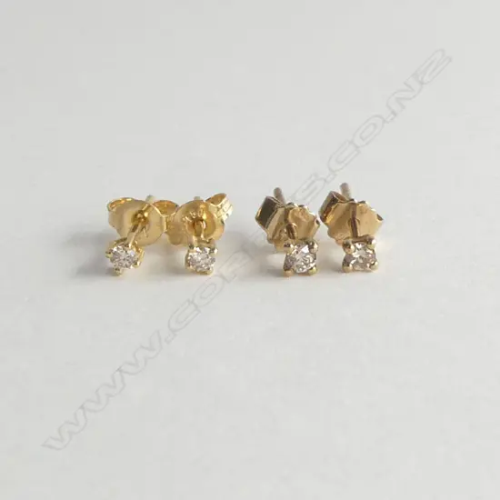 2 PR 9ct DIAMOND SET STUDS, new old stock