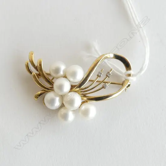 9CT GOLD 7 PEARL & 3 DIAMOND BROOCH 8.4gms