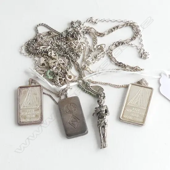 ASST. SILVER PENDANTS & NECKLACES: 3 INGOTS 2 ON CHAINS + UNUSUAL FIGURE ON CHAIN + 2 OTHER CHAINS 41gms