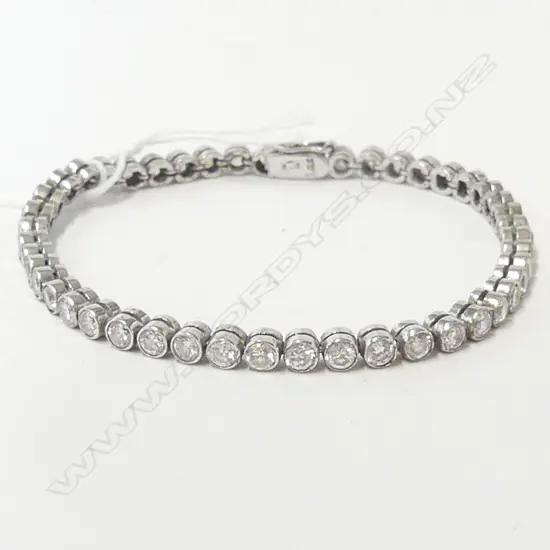 STG & FAUX DIAMOND TENNIS BRACELET