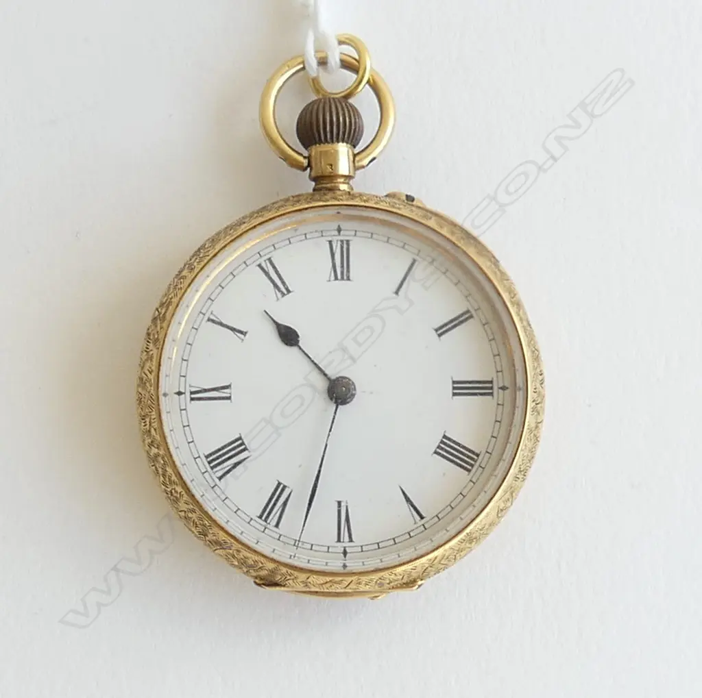 18CT GOLD LADIES FOB open face apparently running 38.8gms Image 1++