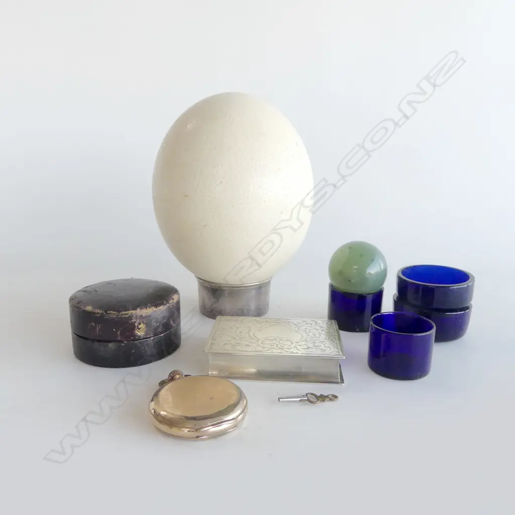 TRAY OF MISC. OLD ITEMS INCL OSTRICH EGG, BLUE GLASS CONDIMENT INNERS, POCKET WATCH, TRINKET BOOK & LEATHER CASED CUP Image 1++