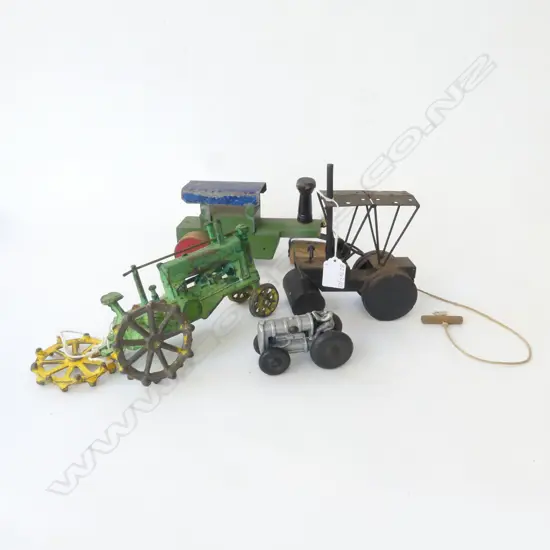 FOUR VINTAGE TOY TRACTORS CAST IRON, WOODEN ETC, ONE WHEEL DETACHED L.90MM-210MM