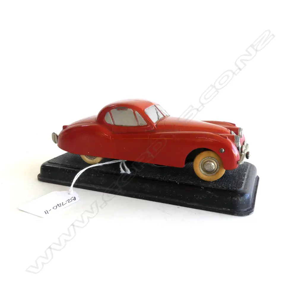 VINTAGE PRAMETA (Germany) CLOCKWORK MODEL of JAGUAR XK120 ON STAND w OFFICIAL KEY ATTATCHED TO UNDERSIDE, 1940-49 Image 1++