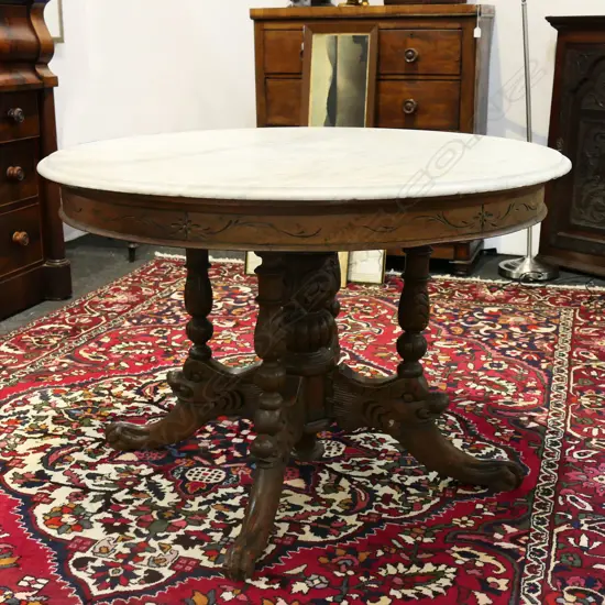A c1900 circular MARBLE TOPPED HARDWOOD PEDESTAL DINING TABLE. minor faults Dia.1100mm