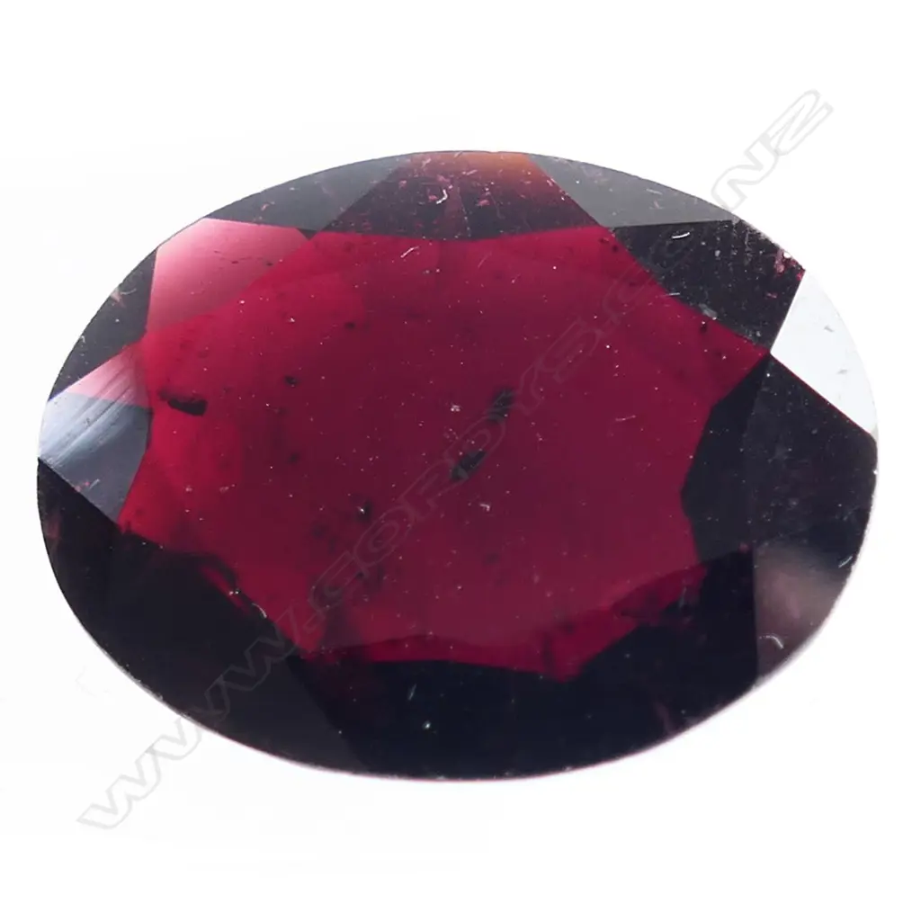 29ct ALMANDINE GARNET, OVAL MIXED CUT w. CERT. Image 1++