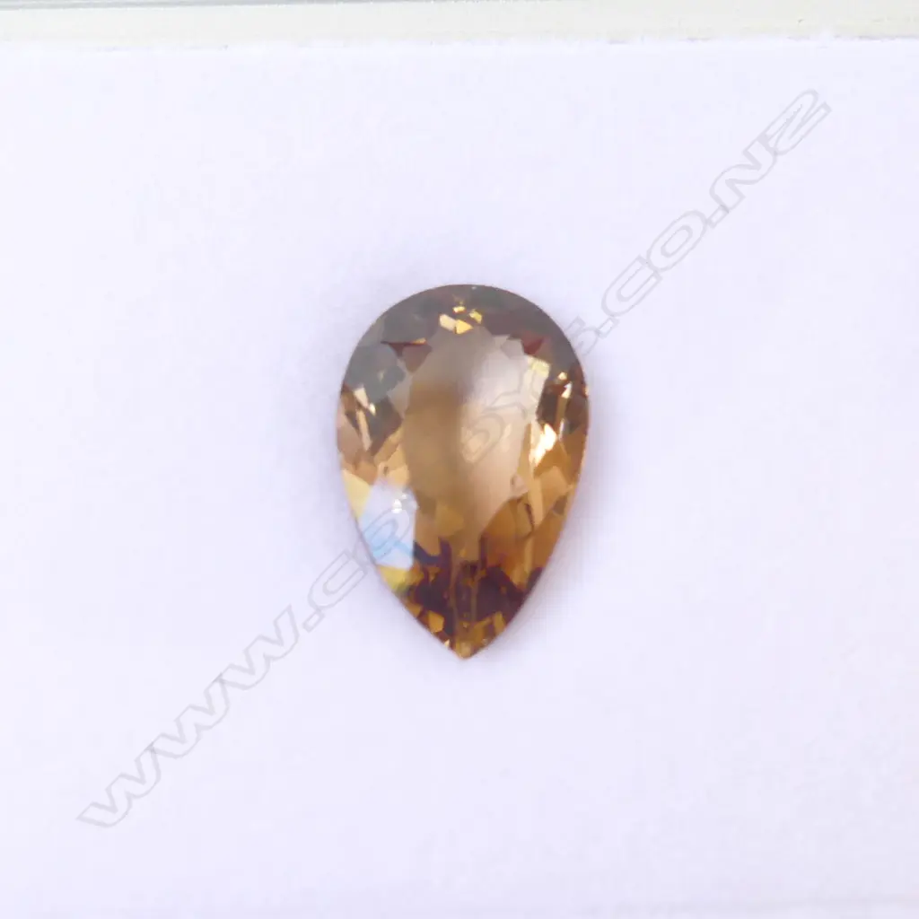 NATURAL IMPERIAL PEAR CUT TOPAZ, 12.23cts, AIG report  (CHIP TO POINT) Image 1++
