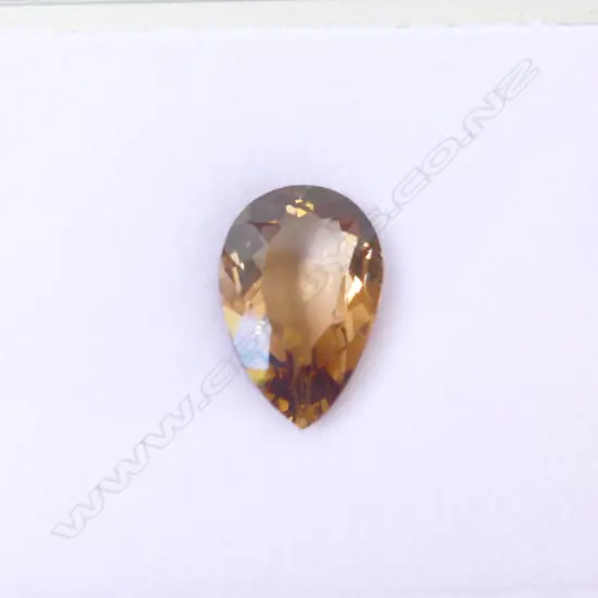 NATURAL IMPERIAL PEAR CUT TOPAZ, 12.23cts, AIG report  (CHIP TO POINT)