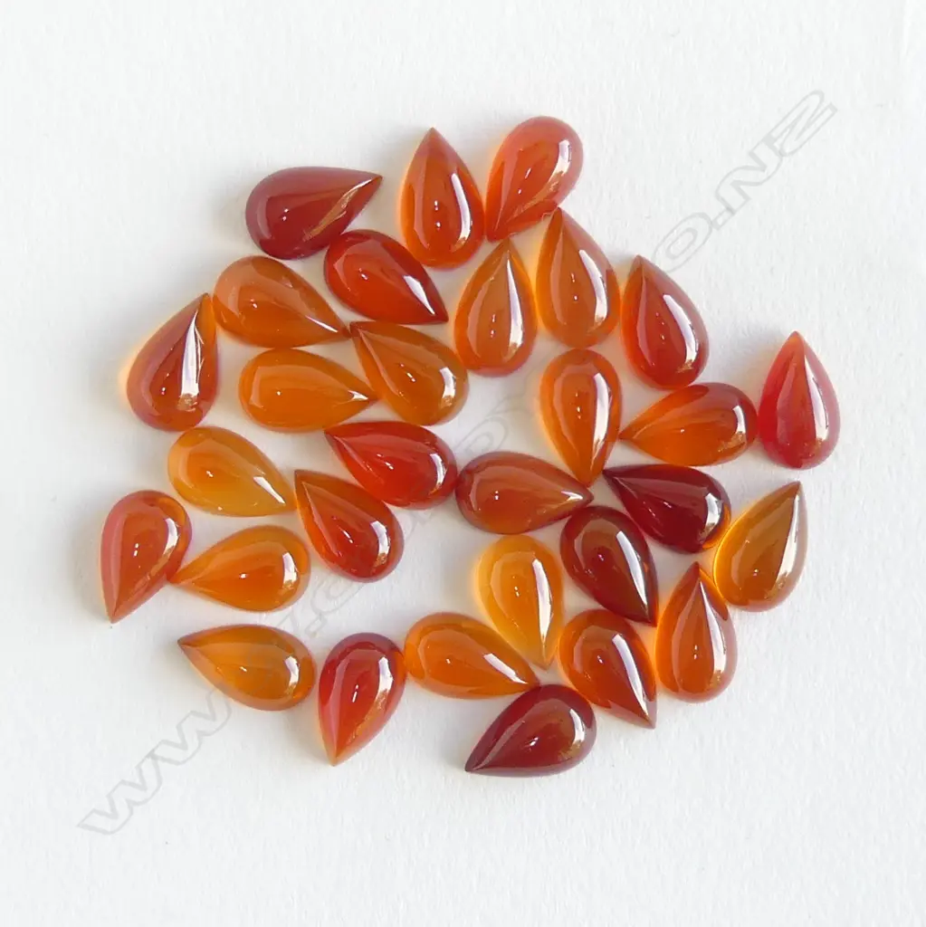 PEAR SHAPED CARNELIAN CABOCHONS Image 1++