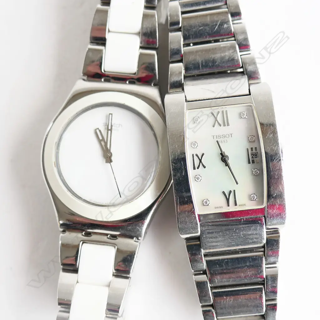 2 LADIES WRIST WATCHES; TISSOT & SWATCH  (not going) Image 1++