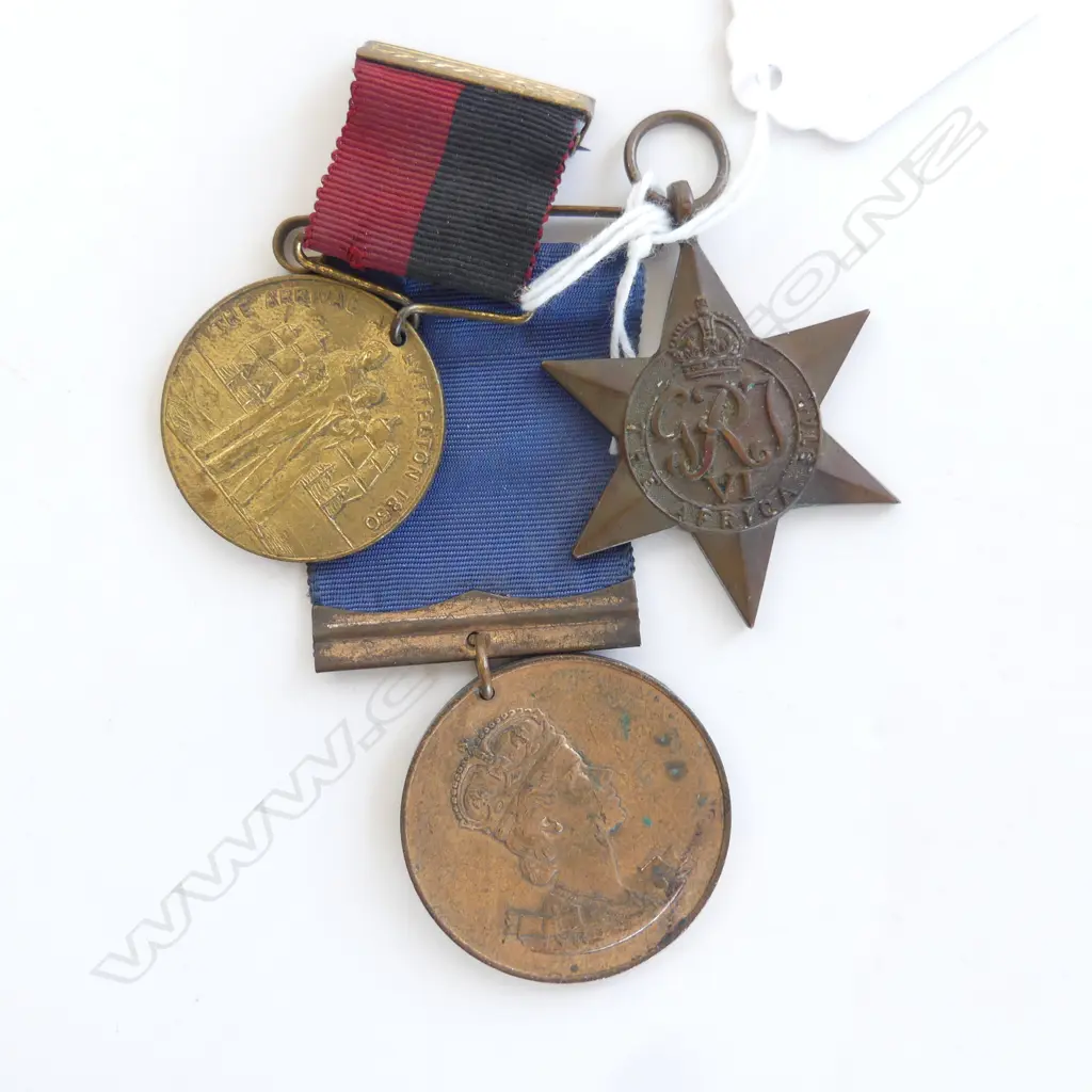 AFRICA STAR MEDAL AND TWO OTHER COMMEMORATIVE MEDALS Image 1++