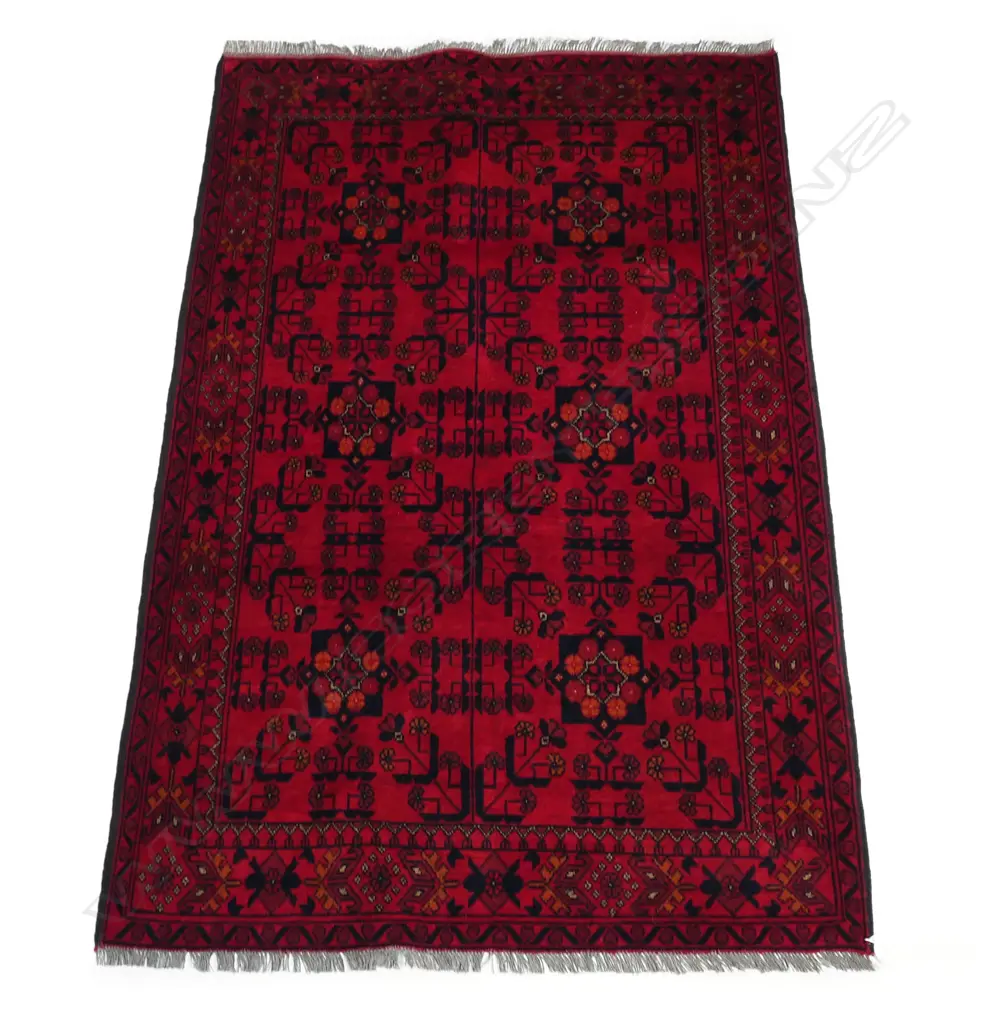A hand knotted Andkhoy rug the field decorated with geometric and floral patterns, multiple border guards. 2000 x 1250mm. Image 1++