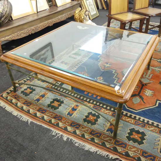 GLASS TOPPED COFFEE TABLE