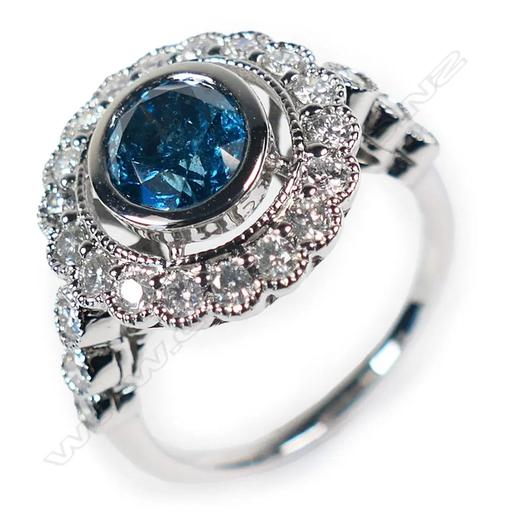 A 14ct white gold blue diamond antique style halo ring, Image 1++