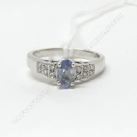 9CT W/G CEYLONESE SAPPHIRE AND DIAMOND RING SIZE N