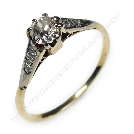 An estate 18ct gold and platinum diamond solitaire ring,