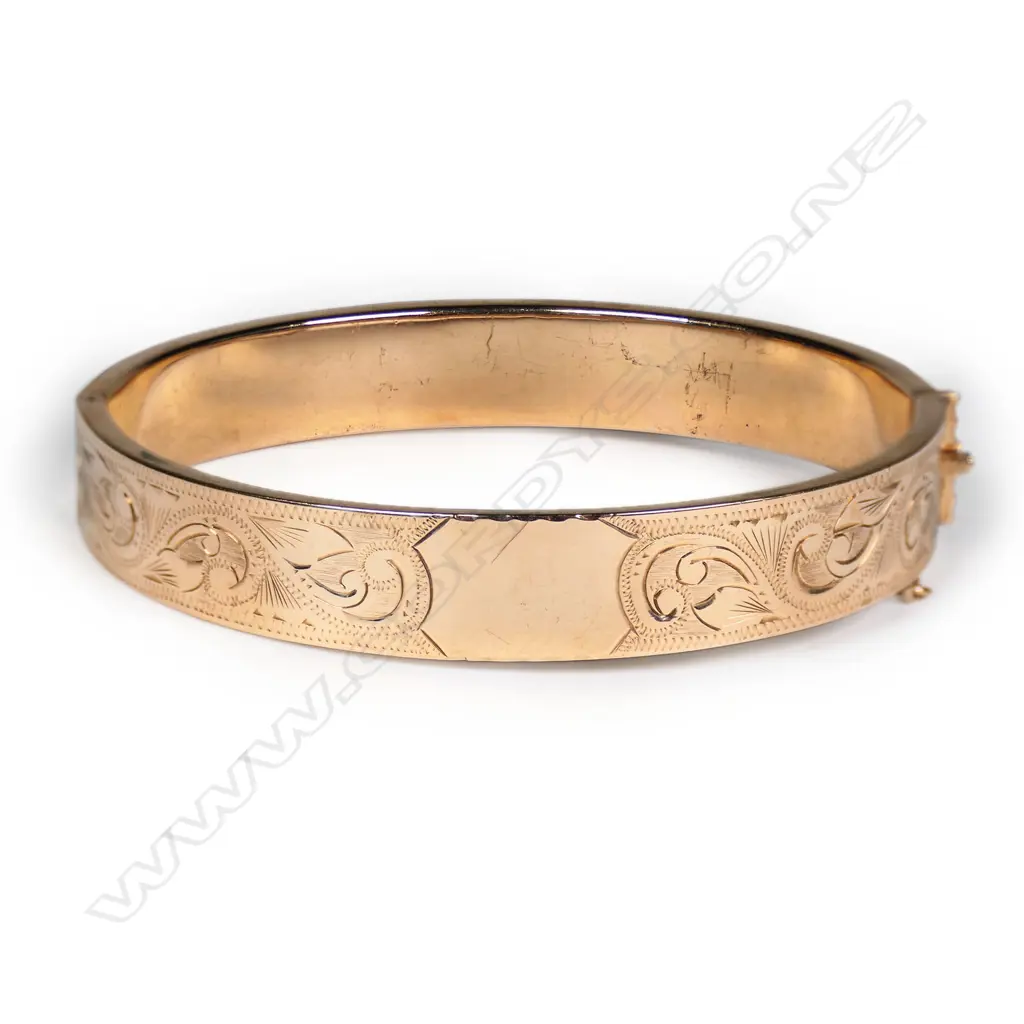 A 9ct rose gold hinged bangle, Image 1++