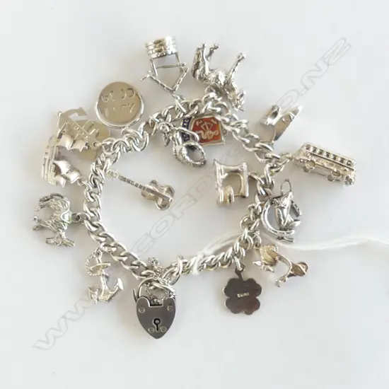 SILVER VINTAGE 16 CHARM BRACELET: anchor + anvil + well + guitar etc 50gm