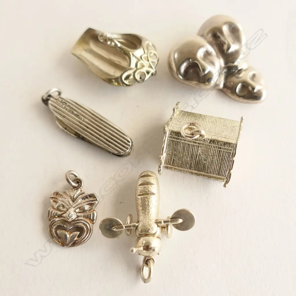 5 SILVER CHARMS + SILVER 3 MASK PENDANT: Whare + Maori bailer + mask + buzzy bee + pocket knife Image 1++