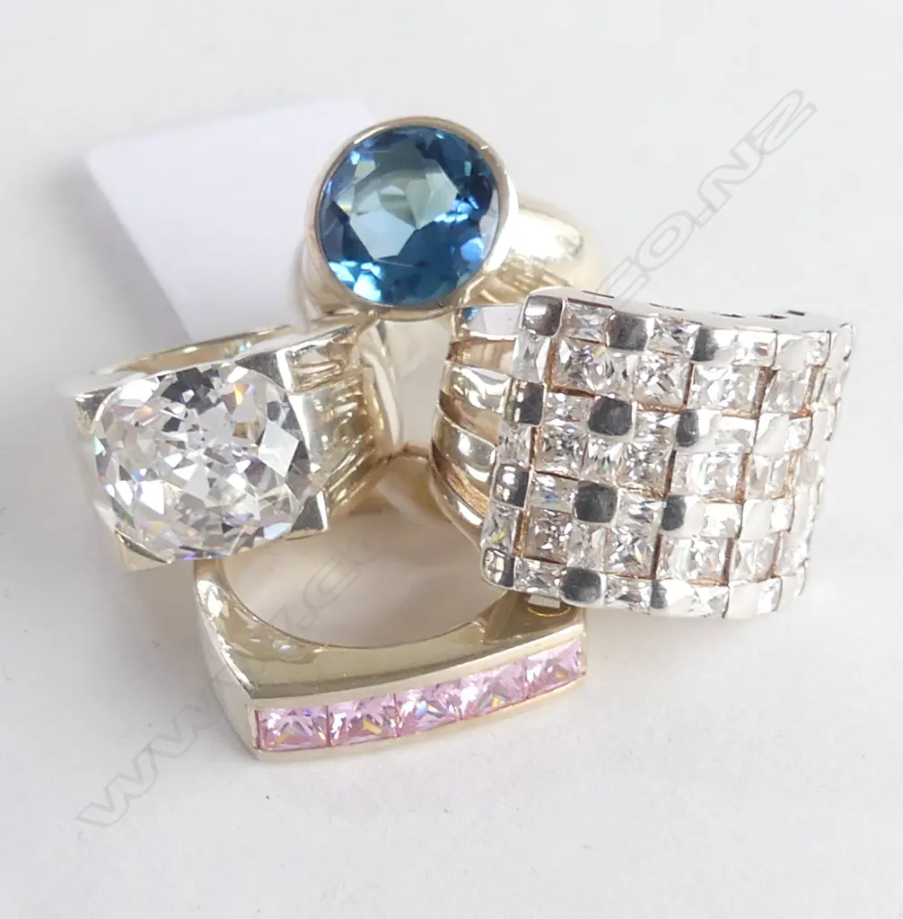 4 SILVER COSTUME RINGS, new old stock, various sizes Image 1++