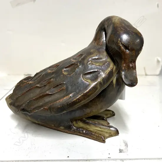 SCULPTED POTTERY DUCK LABELLED BILL & HELEN ROBERTS of WAIHI heavy dark brown green glaze L.210mm